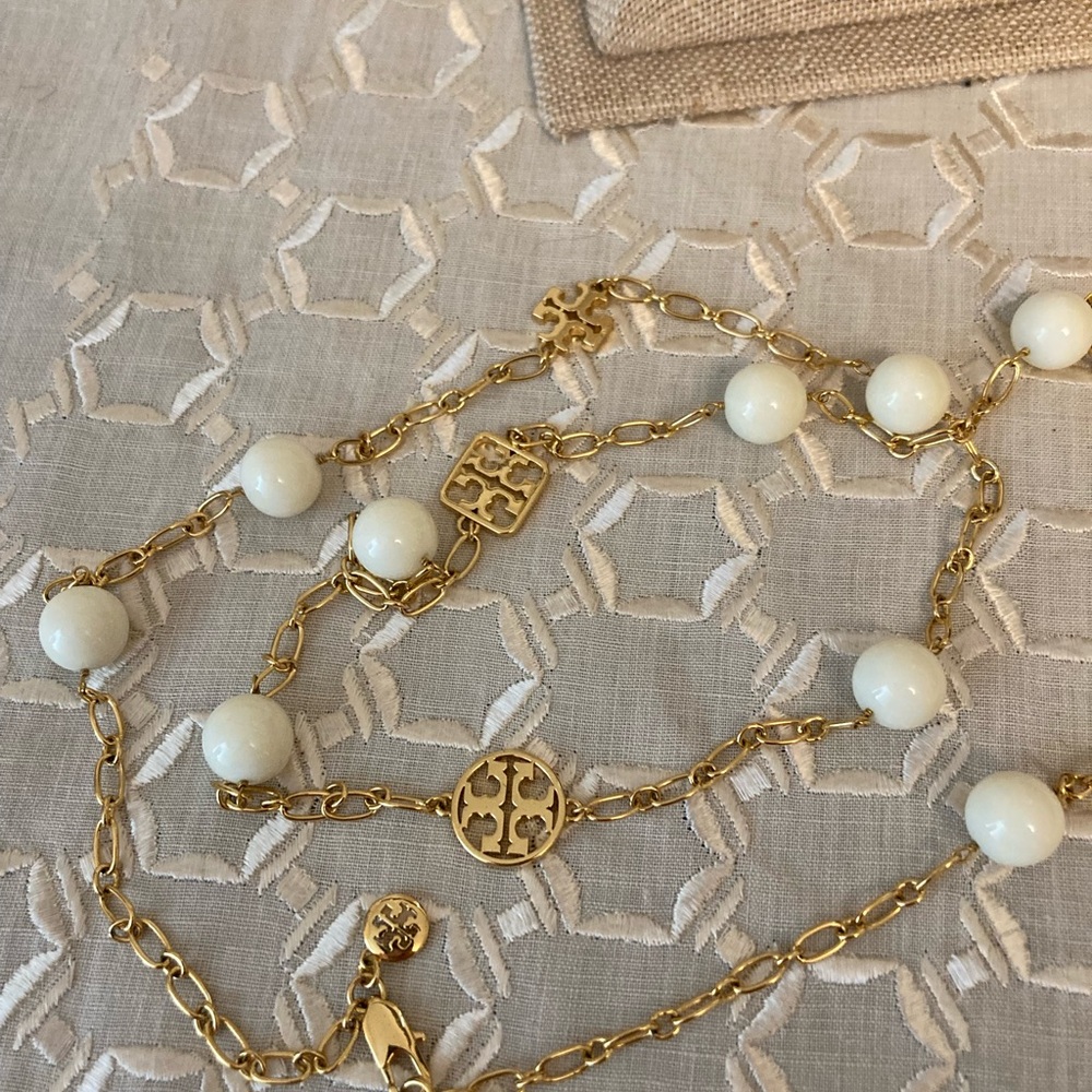 Tory Burch Gold and White Beaded Necklace with Storage Pouch